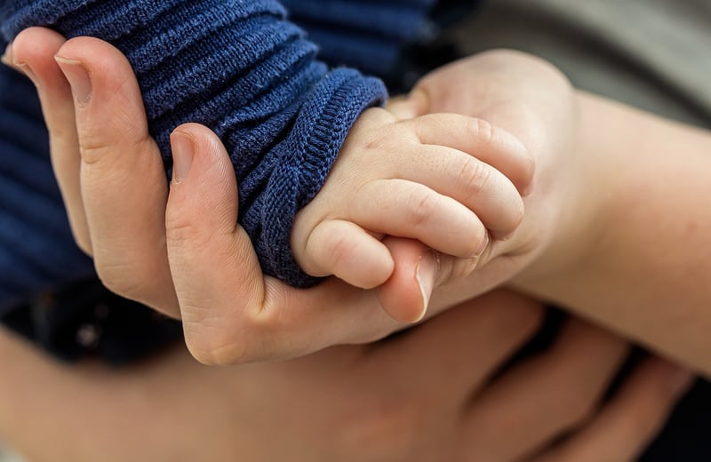 Hands reaching out in unity